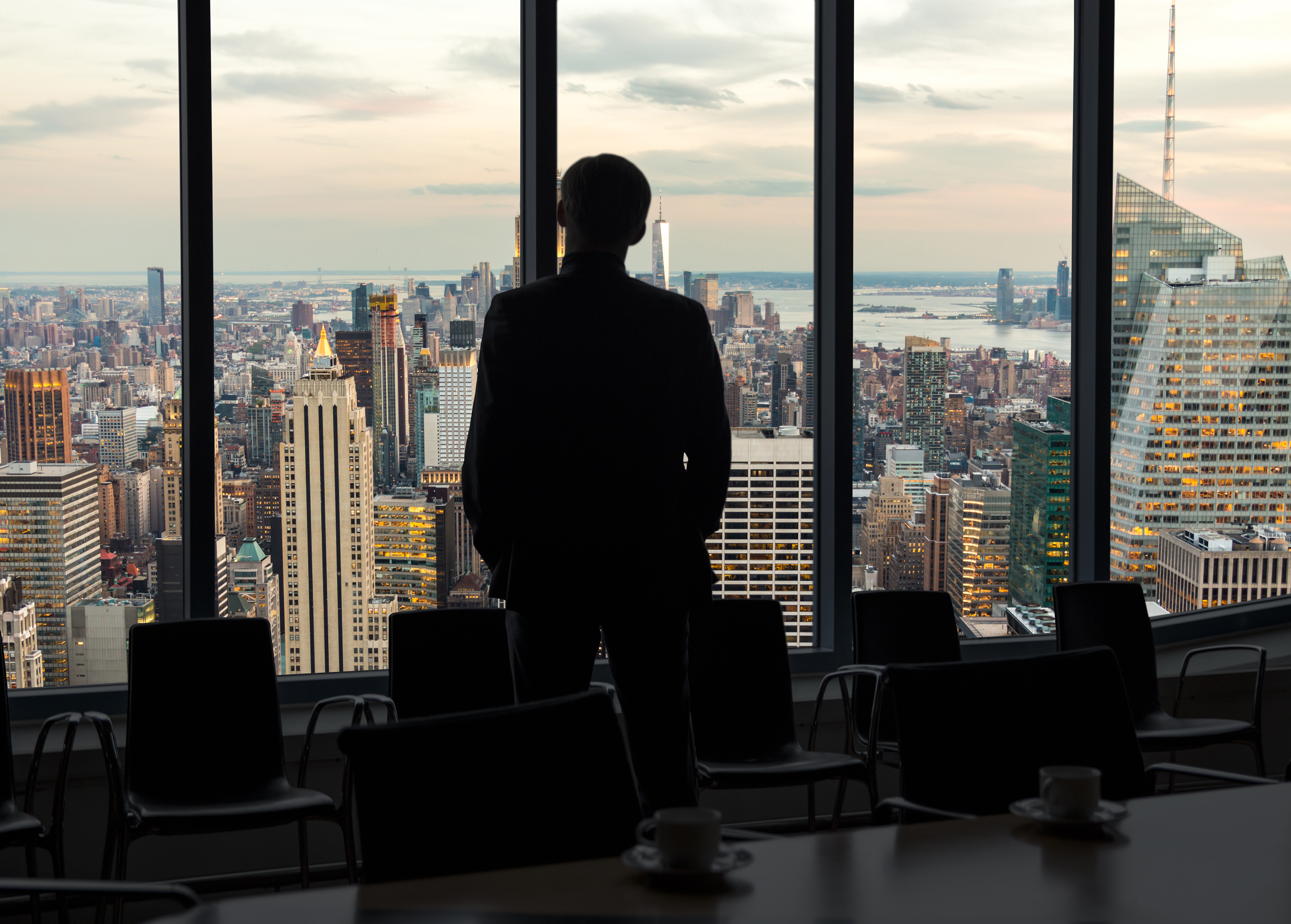 Strategy discussion overlooking a city skyline